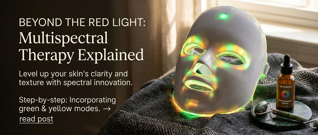 Aurona LED light therapy mask glowing green on cozy surface with jade roller - does red light therapy actually work 2026